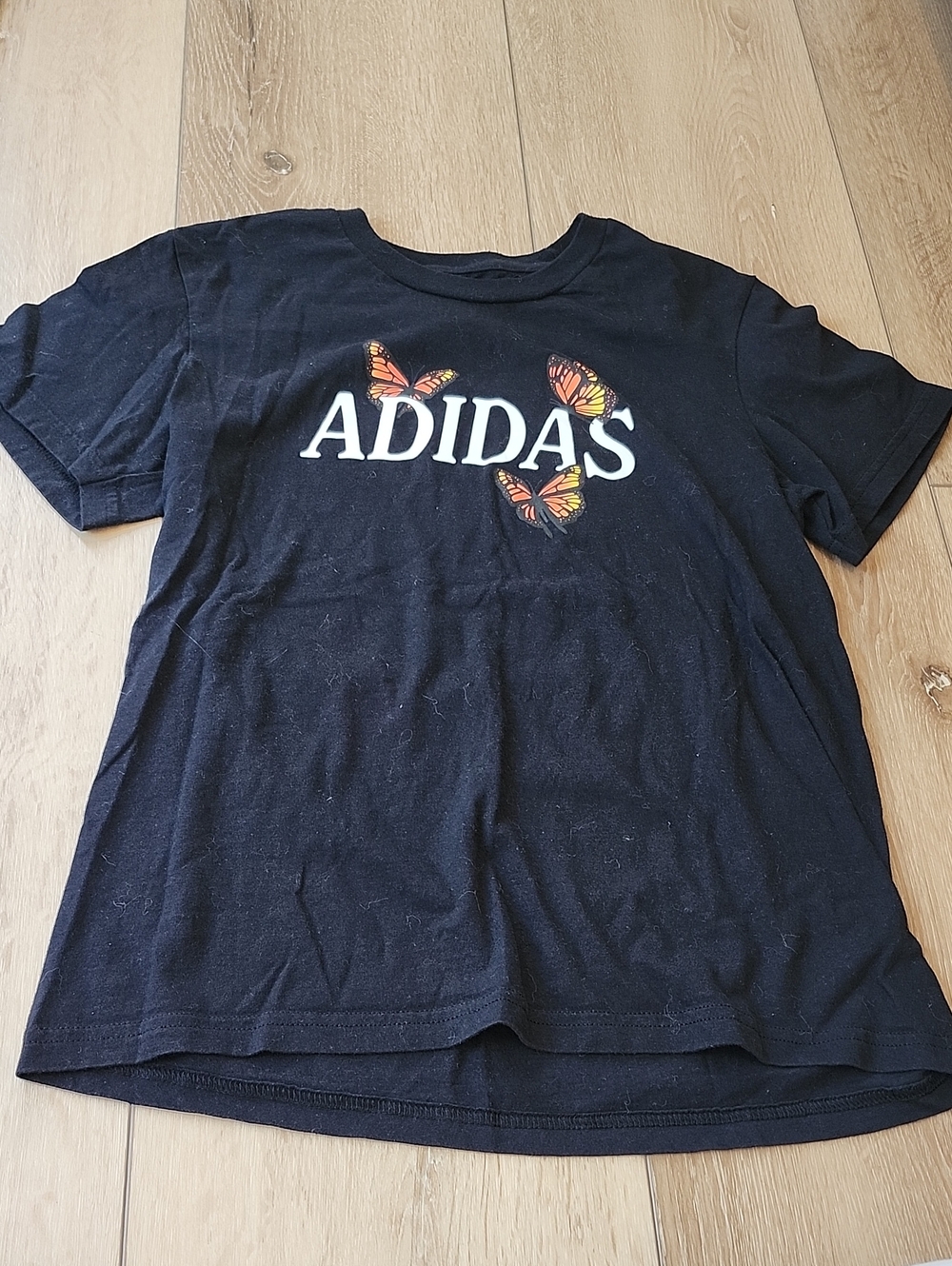 adidas Black Tee with Orange Butterfly Logo, Womens Small